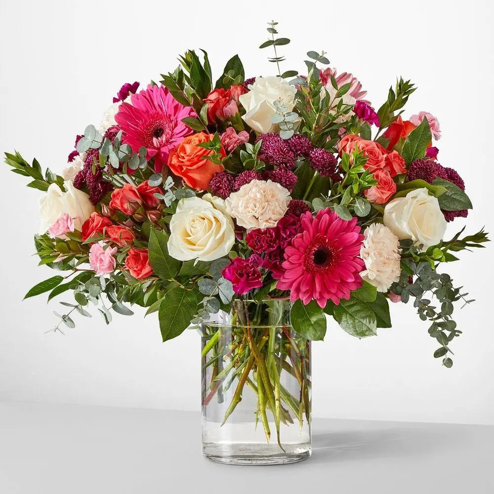I'm Thinking of You Flowers - Heartfelt bouquet of colorful blooms in a clear vase.